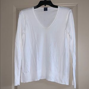 White sweater. No stains